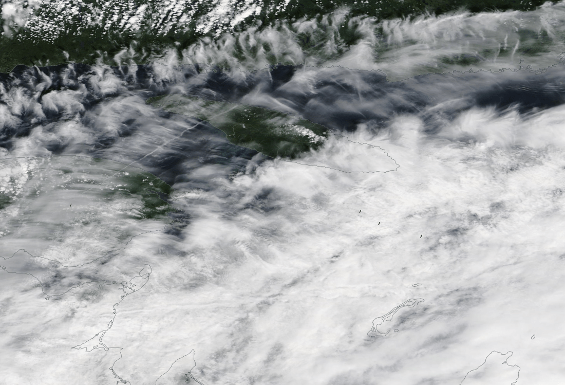 Anticosti Island 23 July 2019  https://go.nasa.gov/2y5dH8k ... and I would think a generally modified chemtrail / geoengineering sky. 